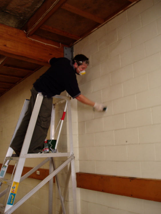 Duncan cleaning the wall. Duncan cleaning the wall.